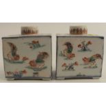A pair of Chinese Kangxi porcelain tea cannisters, of rectangular form, decorated with cockerels,