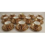 A Royal Crown Derby composite tea set, comprising 12 tea cups of quarter lobed serpentine form,
