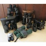 A collection of binoculars, to include Ross of London, TCM, Zoom, etc.