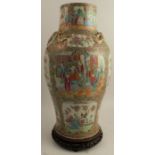 A 19th century Canton famille rose vase, of baluster form, with relief moulded gilt dragons,