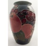 A Moorcroft Pottery vase, decorated in the bird and Berry pattern, height 4.25ins - Good condition