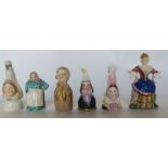 Six various unmarked candle snuffers, to include the French Cook, a blushed ivory young boy,