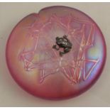 A Glasform pink iridescent glass paperweight, mounted with a silver frog, etched J Ditchfield to