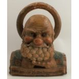 A late 19th century Black Forest polychrome bearded head and halo carved wood bust, titled Herr lass
