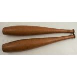 A pair of wooden exercise clubs, length 18ins