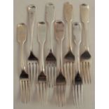 Eight hallmarked silver dessert forks, mainly fiddle pattern, all engraved with names or initials,