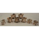 A set of five silver octagonal silver napkin rings, engraved with an initial, Birmingham 1915,