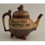 A Doulton Lambeth stoneware teapot by Mark V Marshall, with a genie handle, mask spout and