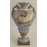 A Royal Worcester pedestal vase, the powder blue ground decorated with three swans swimming with