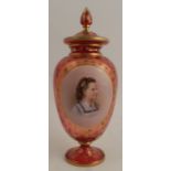 A Bohemian ruby glass covered vase, with painted cameo panel of a girl, and gilded ivy leaf