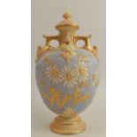 A Royal Worcester covered blush ivory vase, the powder blue ground body decorated with white and