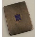 A silver engine turned cigarette case, with enamelled initials, Birmingham 1930, weight 5oz