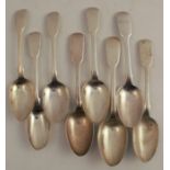 Eight hallmarked silver fiddle pattern dessert spoons, all engraved with names or initials, weight