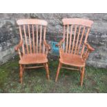 Two similar spindle back kitchen Windsor armchairs