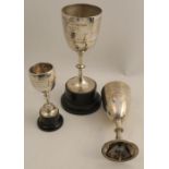 Three hallmarked silver trophies, with presentation and winners inscription, two on plastic bases