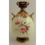 A Royal Crown Derby twin handled vase, having flared neck, painted with roses, height 7.5ins -