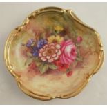 A Royal Worcester pin dish, of shaped circular form, decorated with flowers by Freeman, diameter 4.