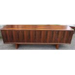 A Gordon Russell 1970's Rosewood dining suite, comprising extending dining table, max length