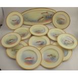 A Royal Worcester fish service, comprising 12 plates with named fish to an ivory and chased gilt