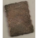 A silver card case, with engraved decoration and inscription, Birmingham 1902, weight 2oz