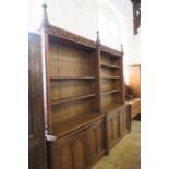 A 19th century gothic double bookcase, divided into two sections, each having an upper section of