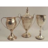 Three hallmarked silver trophies, with presentation and winners inscription, weight 19oz