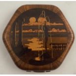 An Art Deco marquetry lady's compact, the cover decorated with a naked girl holding a water fountain