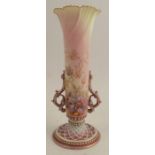 A Royal Worcester vase, with moulded body, decorated with flowers, shape number 1556, height