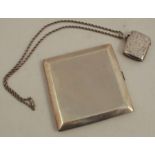 A hallmarked silver cigarette case, of square form with engine turned decoration, together with a