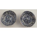 A pair of Kraak style dishes, of circular form, decorated in blue, diameter 3.5ins