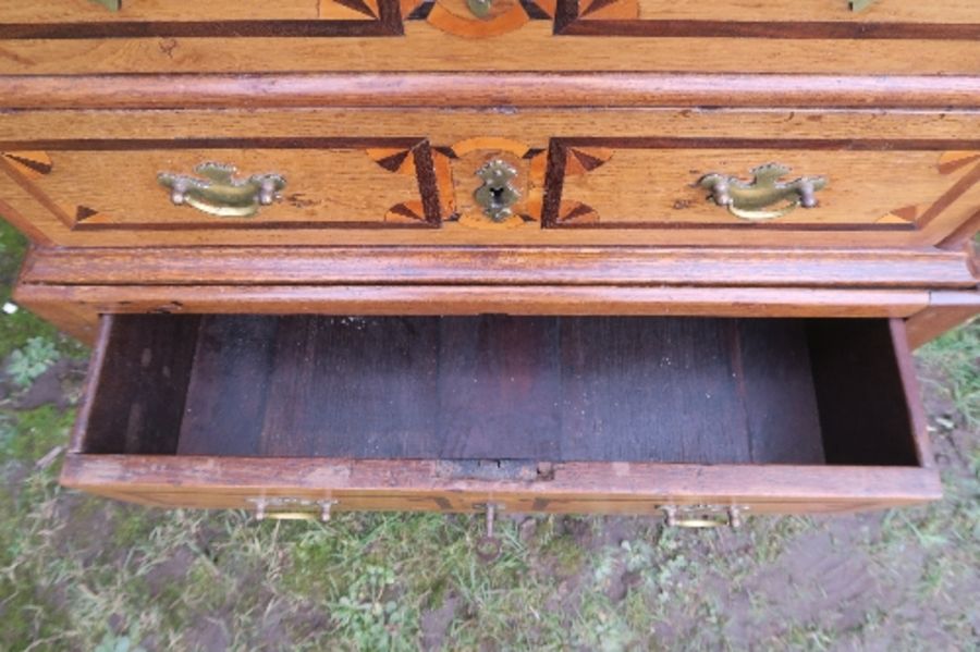 An 18th century design small oak chest on stand, with three drawers, having inlaid and cross - Image 3 of 5