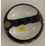 A Carlton Ware ashtray, jewelled with birds and flowers to a dark blue ground, diameter 4.5ins -