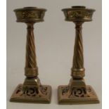 A pair of 19th century Gothic Revival brass candlesticks, with foliate pierced gallery top,