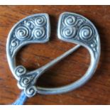 An Alexander Richie Iona silver scarf pin, with swirl decoration