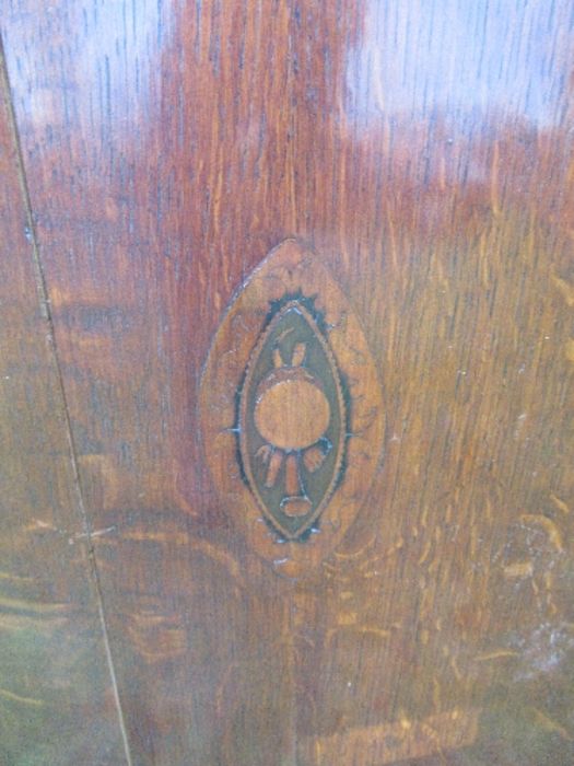 A Georgian oak bow front corner cupboard, the doors having inlaid decoration, opening to reveal - Image 2 of 5