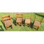 Eight children's wooden chairs