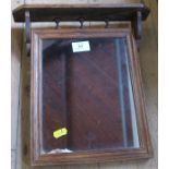 A small oak framed wall mirror, with gallery over, overall size 13.5ins x 13ins