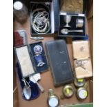 A collection of items, to include brass pocket watch cases, a hallmarked silver christening spoon