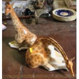 Two USSR porcelain models, of giraffes