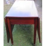 A 19th century mahogany drop leaf table, raised on square tapering legs terminating in brass caps