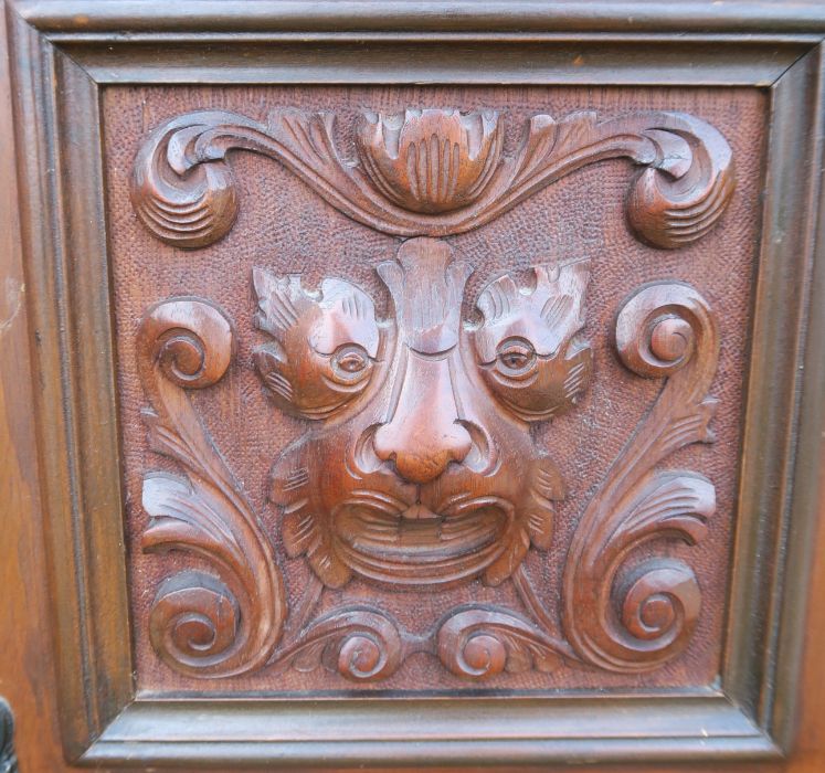 An Edwardian oak pot cupboard, with carved decoration to door and back, height 35ins, together - Image 4 of 4