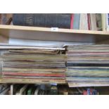 A shelf of LP and single's records