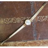 A 9ct gold cased Garrard ladies wrist watch