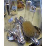 A collection of hallmarked silver, to include dressing table items and three glass and silver topped