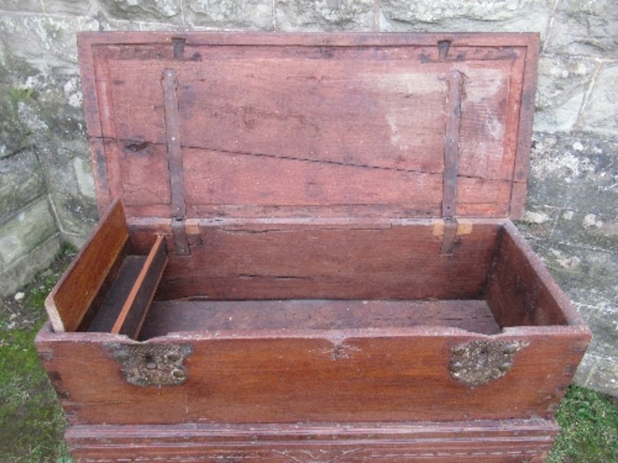 A 19th century hardwood Indonesian dowry chest, with two escutcheons and locking plates, having a - Image 8 of 9