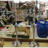 A pair of large silver coloured candelabra, height 32ins