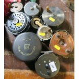 A collection of fishing reels, to include Hardy Brothers, Daiwa, etc.
