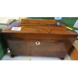 A 19th century rosewood tea caddy, with fitted interior