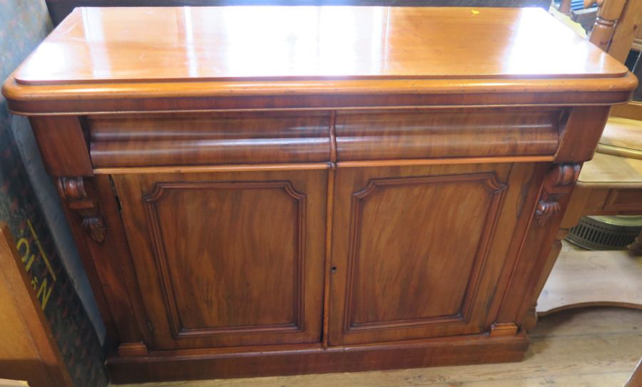 A 19th century mahogany sideboard, fitted with two frieze drawers over a pair of cupboard doors