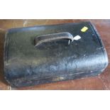 A leather covered Pearce case, the interior fitted with a mother of pearl manicure set, brushes,